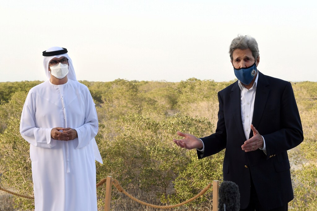 U.S. Special Presidential Envoy for Climate John Kerry speaks alongside UAE Special Envoy for Climate Change and Abu Dhabi National Oil Company CEO, Sultan Ahmed Al Jaber, during a visit to Jubail Mangrove Park, in Abu Dhabi, United Arab Emirates April 3, 2021.