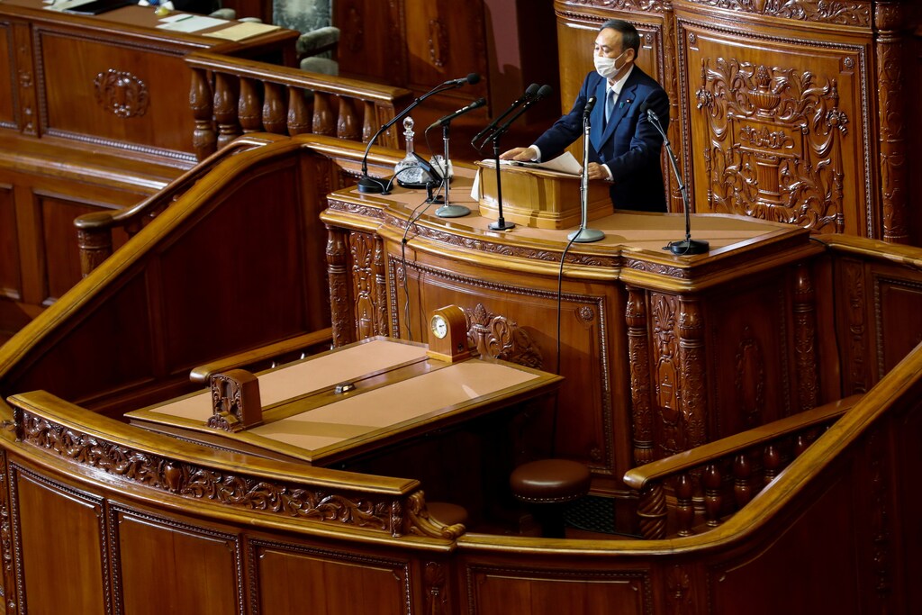 Japanese Prime Minister Yoshihide Suga gives his first policy speech in parliament as an extraordinary session opens in Tokyo, Japan October 26, 2020. REUTERS/Kim Kyung-Hoon - RC25QJ9QGDUP
