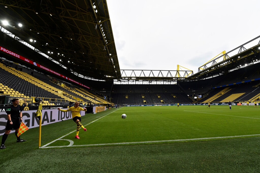 Soccer Football - Bundesliga - Borussia Dortmund v Schalke 04 - Signal Iduna Park, Dortmund, Germany - May 16, 2020 Dortmund's Erling Haaland kicks the ball, as play resumes behind closed doors following the outbreak of the coronavirus disease (COVID-19) Martin Meissner/Pool via REUTERS DFL regulations prohibit any use of photographs as image sequences and/or quasi-video - RC2XPG9GXCOL