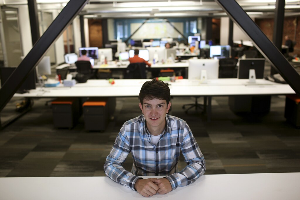 David Rusenko, founder and CEO of Web-building service Weebly, poses for a photograph at the company's headquarters in San Francisco, California February 28, 2013. Working from home is common enough in Silicon Valley, but that is in addition to - not instead of - the 40-plus hours spent working in the office. Despite the area's image as a freewheeling space that makes much of the technology that allows people to work remotely, Bay Area workers tend to head into the office, especially at start-ups. Rusenko says it simply becomes more efficient for everyone to sit together. REUTERS/Robert Galbraith (UNITED STATES - Tags: SCIENCE TECHNOLOGY BUSINESS) - RTR3EF10