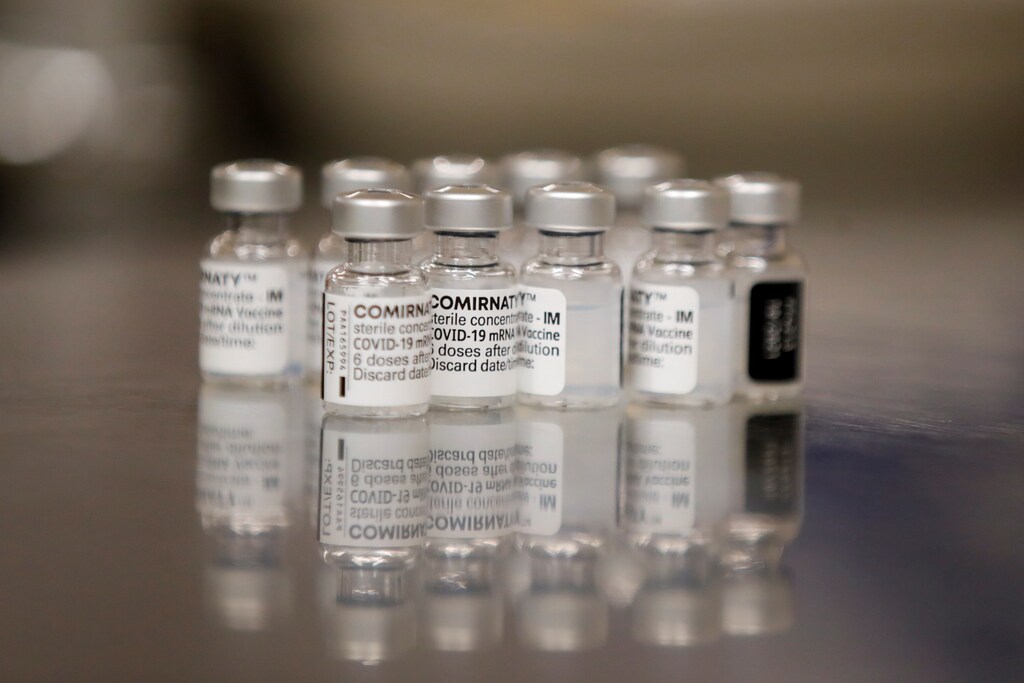 Vials of the Pfizer-BioNTech "Comirnaty" vaccine against the coronavirus disease (COVID-19) are pictured at a vaccination center in Paris, France, July 23, 2021. REUTERS/Sarah Meyssonnier - RC29QO9NP61W