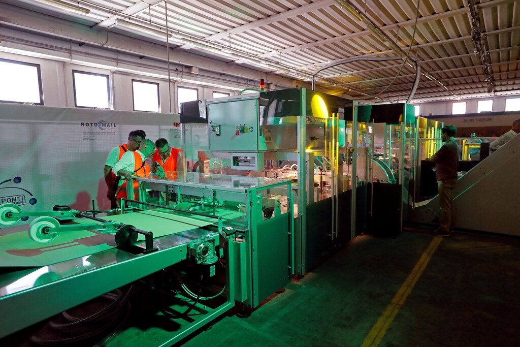 A CartonWrap machine, which packs customer orders in tailor-made cardboard boxes is displayed at a factory of Italian packaging company CMC Srl in Citta di Castello, Italy, June 25, 2019. Picture taken June 25, 2019. REUTERS/Remo Casilli - RC13AEAD1E90