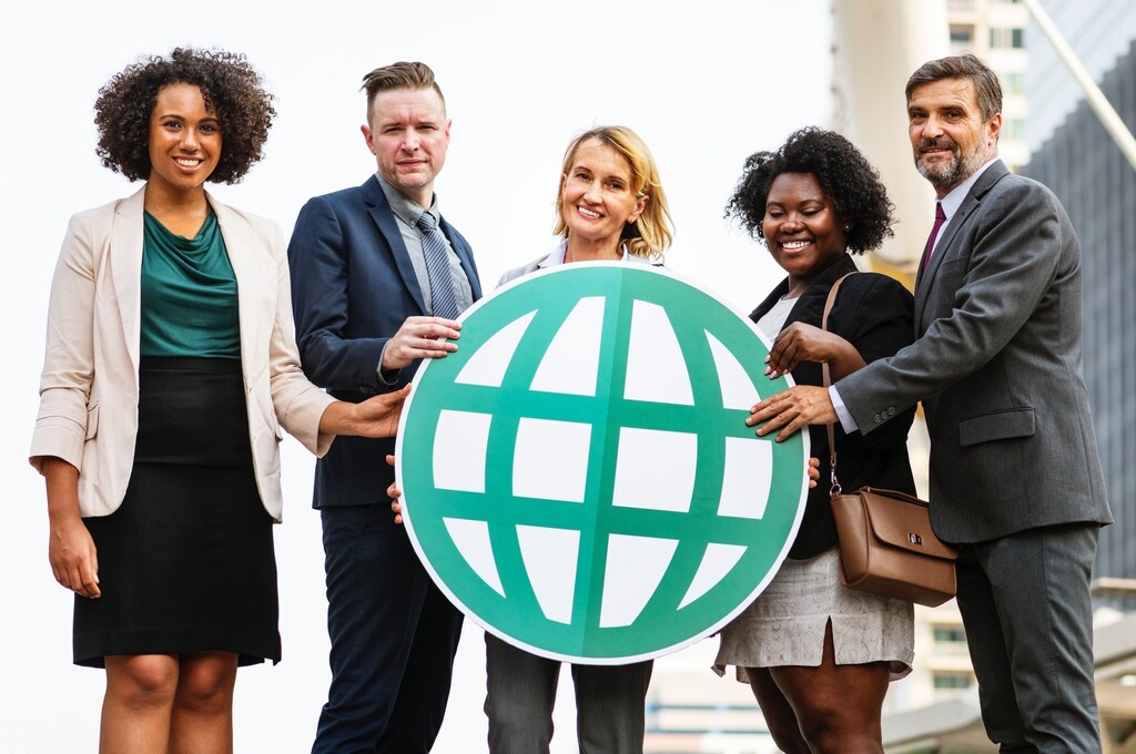 People cluster around a business logo.