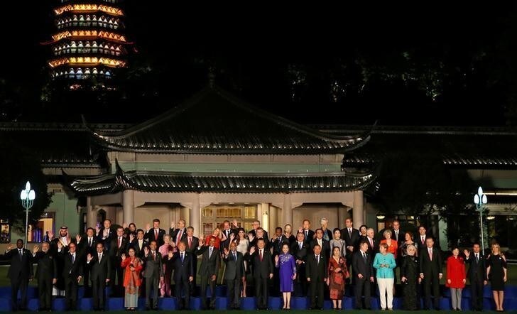 Leaders pose for a family picture during the G20 Summit in Hangzhou, Zhejiang province, China September 4, 2016.