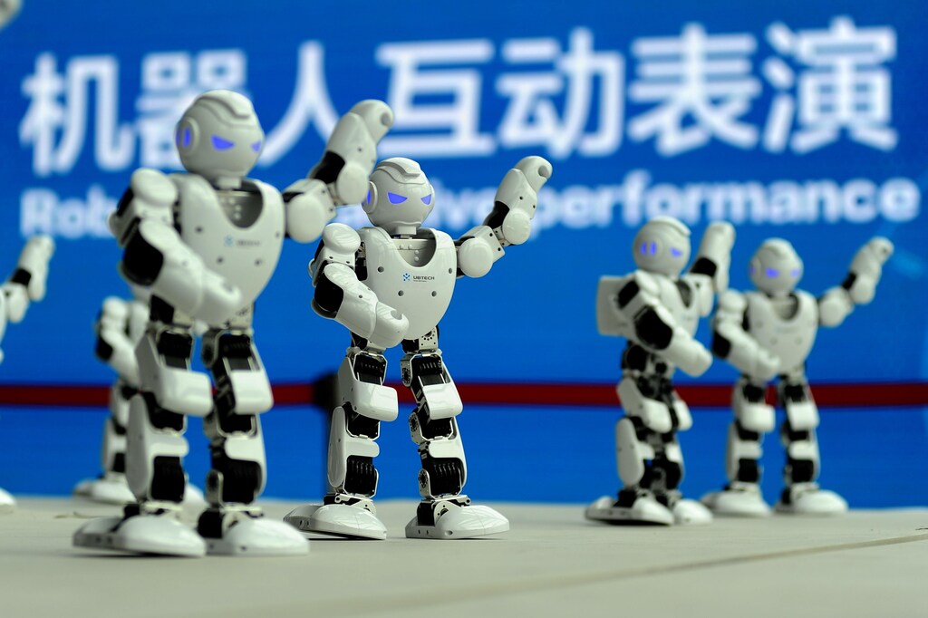 Ubtech robots perform a synchronised dance at the World Intelligent Manufacturing Summit in Nanjing, China.