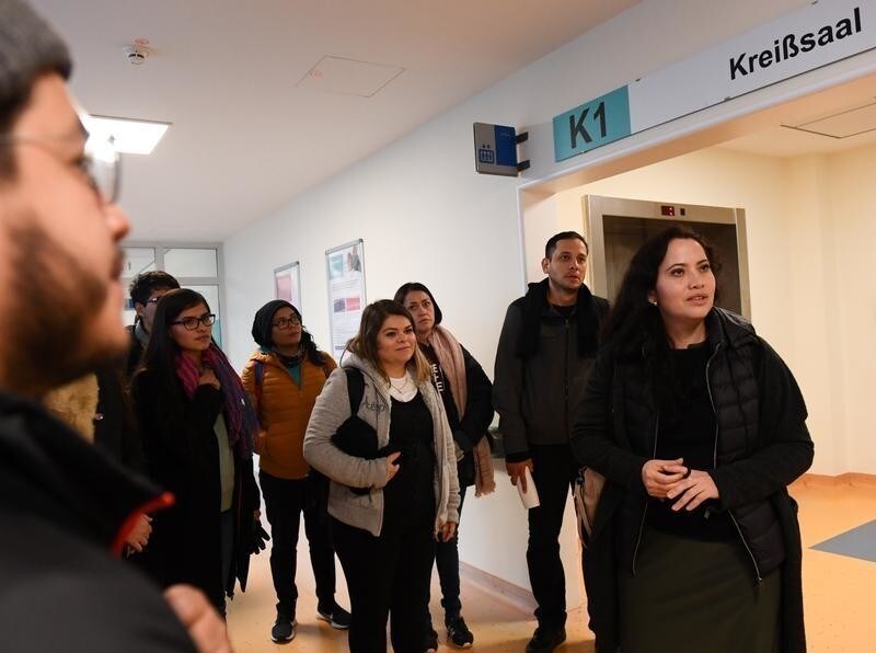 A group of people from Mexico with academic nursing training takes an introductory tour of the Helios Clinic area in Schwerin, Germany, January 8, 2020. Recruiting foreign specialists is a means against the shortage of skilled workers in the nursing sector. Picture taken January 8, 2020. REUTERS/Annegret Hilse - RC22DE9SQGFM