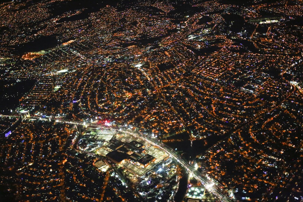 An aerial view of Mexico city at night from an airplane, December 16, 2013. REUTERS/Jorge Silva (MEXICO - Tags: CITYSCAPE SOCIETY) - GM1E9CH159701