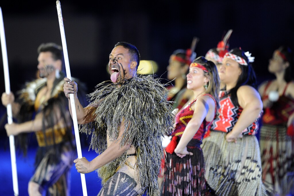 Maori dancers perform for Britain's Queen Elizabeth at the Diamond Jubilee Pageant at Windsor Castle, near London, May 13, 2012. REUTERS/Paul Hackett (BRITAIN - Tags: ROYALS ENTERTAINMENT) - GM1E85E0GUQ01