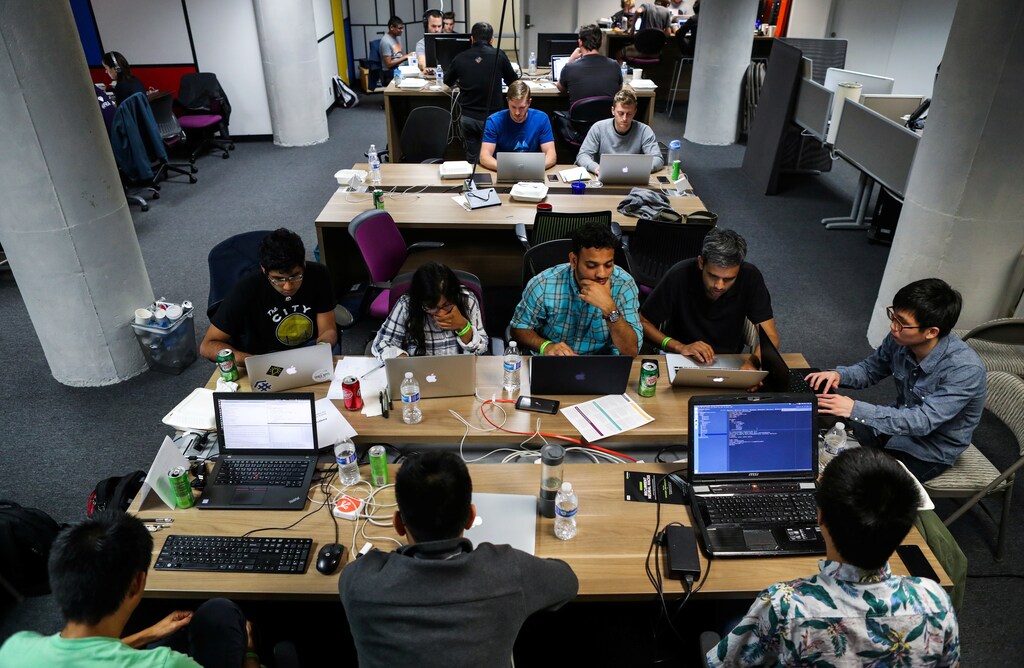 People work on their computers during a weekend Hackathon event in San Francisco, California, U.S. July 16, 2016. REUTERS/Gabrielle Lurie SEARCH "LURIE TECH" FOR THIS STORY. SEARCH "WIDER IMAGE" FOR ALL STORIES. - RTS12CJ0