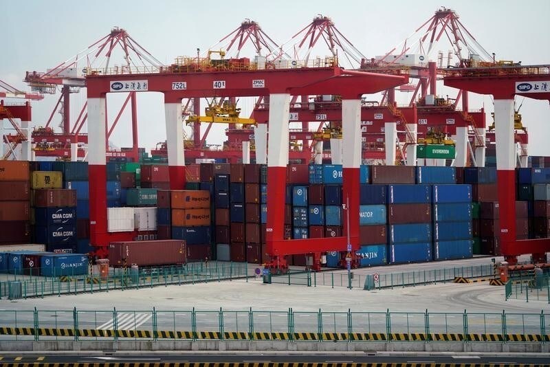 Containers are seen at the Yangshan Deep Water Port, part of the Shanghai Free Trade Zone, in Shanghai, China March 14, 2018.