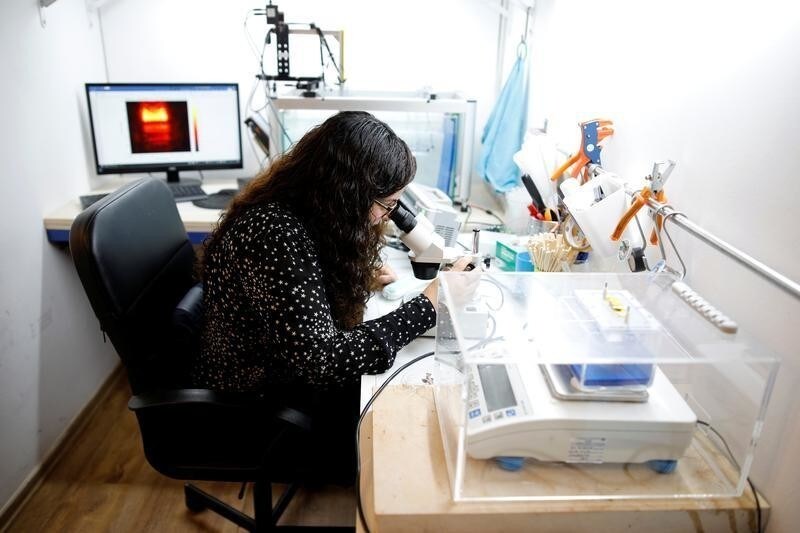 An employee of Israeli company ParaSonic, works at their laboratory in Tel Aviv, Israel October 22, 2018. Picture taken October 22, 2018. REUTERS/Amir Cohen - RC1F67F47D30