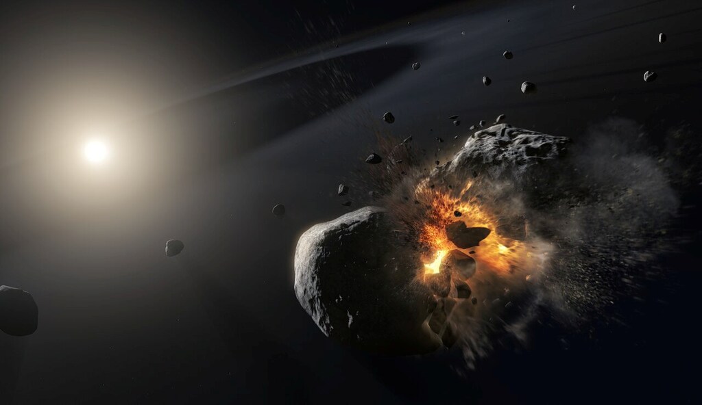 Artist's impression of a collision of two icy asteroid-sized bodies orbiting the bright star.