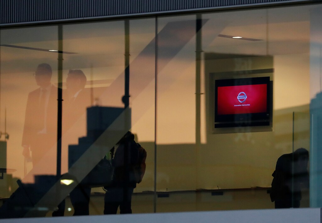 A Nissan logo is seen on a screen at Nissan Motor Co.'s global headquarters building in Yokohama, Japan November 22, 2018. REUTERS/Toru Hanai - RC1A5C8C9740