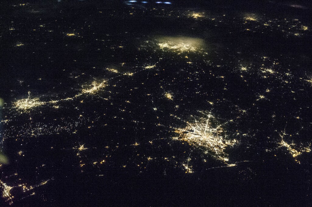 The state of Texas is captured by one of the NASA Expedition 36 crew members aboard the International Space Station, some 240 miles above Earth, used a 50mm lens in this image released on June 27, 2013. The largest metro area, Dallas-Fort Worth, often referred to informally as the Metroplex, is the heavily cloud-covered area at the top center of the photo. Neighboring Oklahoma, on the north side of the Red River, less than 100 miles to the north of the Metroplex, appears to be experiencing thunderstorms. The Houston metropolitan area, including the coastal city of Galveston, is at lower right. To the east near the Texas border with Louisiana, the metropolitan area of Beaumont-Port Arthur appears as a smaller blotch of light, also hugging the coast of the Texas Gulf. Moving inland to the left side of the picture one can delineate the San Antonio metro area. The capital city of Austin can be seen to the northeast of San Antonio. REUTERS/NASA/Handout via Reuters (UNITED STATES - Tags: ENERGY SCIENCE TECHNOLOGY CITYSCAPE) ATTENTION EDITORS - FOR EDITORIAL USE ONLY. NOT FOR SALE FOR MARKETING OR ADVERTISING CAMPAIGNS. THIS IMAGE HAS BEEN SUPPLIED BY A THIRD PARTY. IT IS DISTRIBUTED, EXACTLY AS RECEIVED BY REUTERS, AS A SERVICE TO CLIENTS - RTX113J4