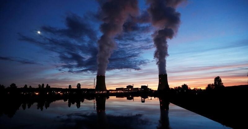 Cooling towers at the Golfech nuclear plant are pictured during sunset on the edge of the Garonne river between Agen and Toulouse, France, September 26, 2017. REUTERS/Regis Duvignau - RC11A18F6210
