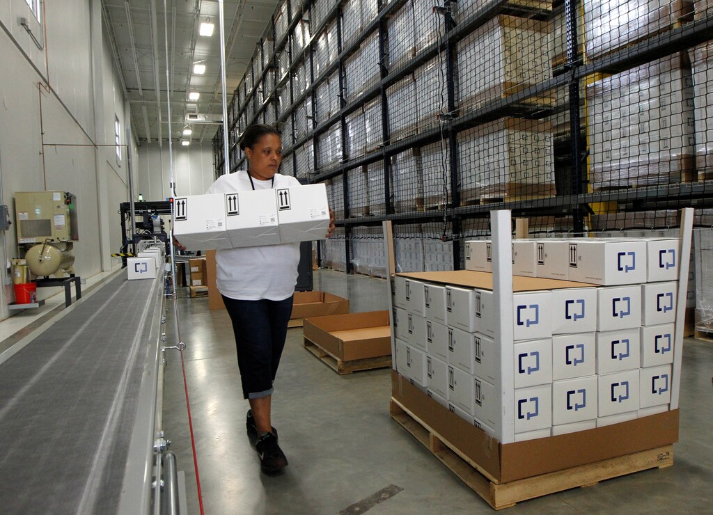 A UPS employee loads boxes of medical supplies in Louisville, Kentucky.