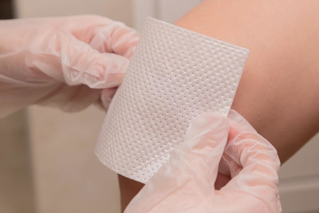 A person’s leg wrapped in bandage (not the smart bandage from this research).