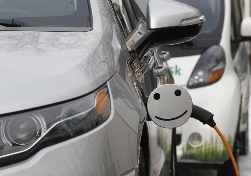 An electric car is charged during a demonstration ceremony to launch a charging station owned by the Moscow United Electric Grid Company (MOESK), in Moscow February 28, 2012. MOESK plans to produce 28 charging stations of different types, charging for 8-10 hours, 4-5 hours and 20-30 minutes, in Moscow and the surrounding region under its "MOESK-EV" project according to the company representatives. REUTERS/Sergei Karpukhin (RUSSIA - Tags: TRANSPORT ENERGY BUSINESS) - GM1E82S1HKL01
