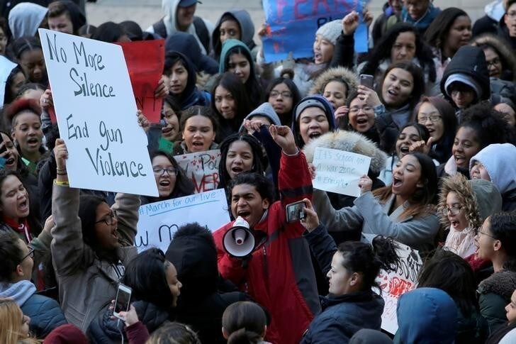Brandon Gonzalez, 16, leads fellow students in protest during a class walkout from the Richard R. Green High School of Teaching while participating in the National School Walkout in Manhattan, New York City, U.S., March 14, 2018. REUTERS/Andrew Kelly