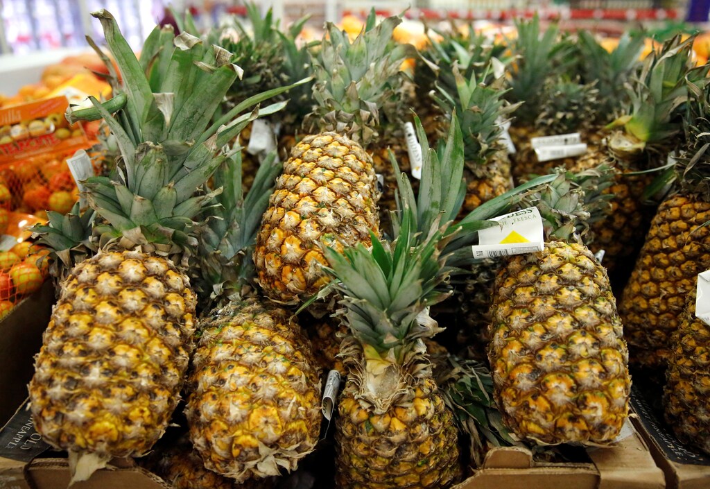 Pineapples are displayed for sale, as the holiday shopping season kicks off with 'El Buen Fin' (The Good Weekend), at a Sam's Club store, in Mexico City, Mexico, November 17, 2017. REUTERS/Henry Romero - RC1BF8D0F130