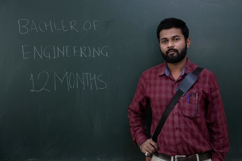 Rahul Dandwate, a 26-year-old Bachelor of Engineering (B.E.) graduate who has been unemployed for one year poses during a job fair in Chinchwad, India, February 7, 2019. "Companies come up with jobs but the salary is very low or they dont want to pay every month. They try to take advantage of so many jobless youngsters by offering low salary." Picture taken February 7, 2019. To match Insight INDIA-ELECTION/JOBS-ENGINEERS. REUTERS/Danish Siddiqui - RC135F11EF00