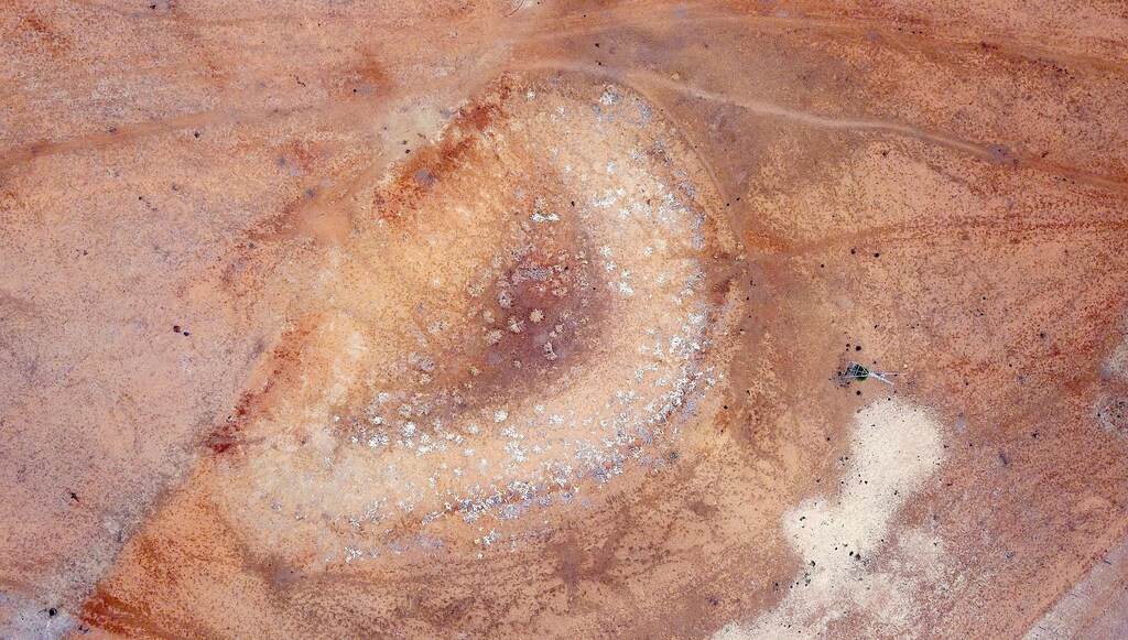 A dried-up dam can be seen on farmer Ash Whitney's drought-effected property located west of the town of Gunnedah in north-western New South Wales in Australia, June 8, 2018. Picture taken June 8, 2018. REUTERS/David Gray - RC188C4D5440