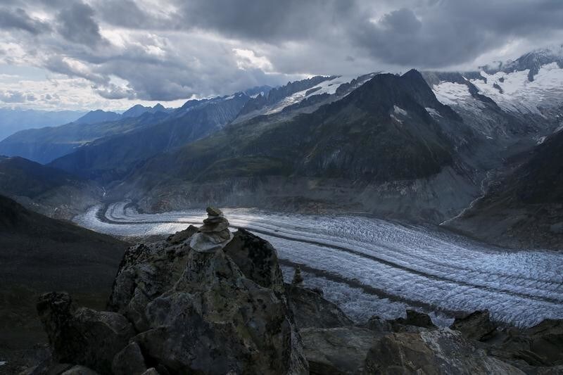 The Aletsch Glacier is pictured from the Eggishorn summit in Fiesch, Switzerland, August 22, 2015. One of Europe's biggest glaciers, the Great Aletsch coils 23 km (14 miles) through the Swiss Alps - and yet this mighty river of ice could almost vanish in the lifetimes of people born today because of climate change. The glacier, 900 metres (2,950 feet) thick at one point, has retreated about 3 km (1.9 miles) since 1870 and that pace is quickening. REUTERS/Denis Balibouse TPX IMAGES OF THE DAYPICTURE 1 OF 31 FOR WIDER IMAGE STORY "EARTHPRINTS: ALETSCH GLACIER". SEARCH "EARTHPRINTS ALETSCH" FOR ALL IMAGES. - RTS4K0T