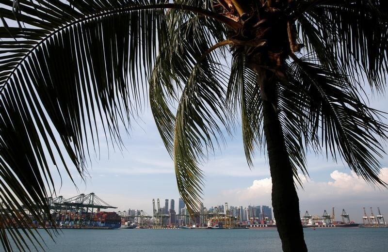 A view of PSA's container terminals and the skyline of Singapore September 28, 2016. REUTERS/Edgar Su - RTSPTTG