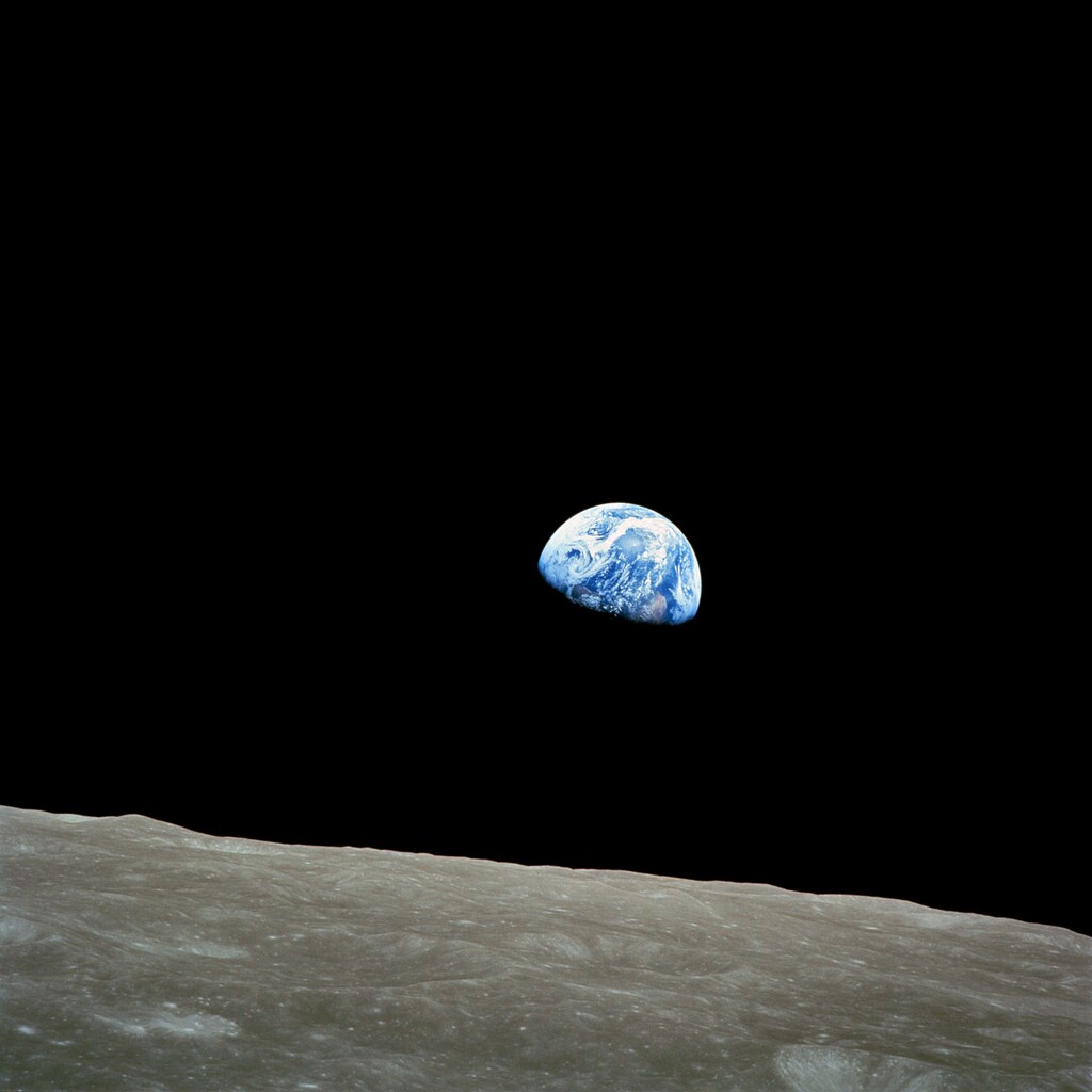 The distant blue Earth is seen above the Moon's limb, in this handout picture taken by the Apollo 8 crew forty-five years ago, on December 24, 1968, courtesy of NASA. Frank Borman, James Lovell, and William Anders were launched atop a Saturn V rocket on December 21, 1968 circled the Moon ten times in their command module, and returned to Earth on December 27. The Apollo 8 mission's impressive list of firsts includes: the first humans to journey to the Earth's Moon, the first to fly using the Saturn V rocket, and the first to photograph the Earth from deep space. REUTERS/NASA/Handout via Reuters (UNITED STATES - Tags: SCIENCE TECHNOLOGY ENVIRONMENT) ATTENTION EDITORS  THIS IMAGE WAS PROVIDED BY A THIRD PARTY. FOR EDITORIAL USE ONLY. NOT FOR SALE FOR MARKETING OR ADVERTISING CAMPAIGNS. THIS PICTURE IS DISTRIBUTED EXACTLY AS RECEIVED BY REUTERS, AS A SERVICE TO CLIENTS - GM1E9CO1S7Q01
