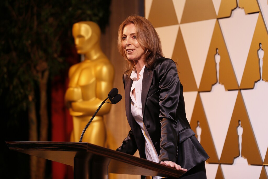 Director Kathryn Bigelow presents director Rithy Panh, whose Cambodian film "The Missing Picture" is nominated in the Foreign Language Film category, with a nomination certificate at the 86th Academy Awards Foreign Language Nominee Reception at Ray's and Stark Bar on the LACMA Campus in Los Angeles, February 28, 2014. REUTERS/Danny Moloshok (UNITED STATES - Tags: ENTERTAINMENT) - GM1EA31176301