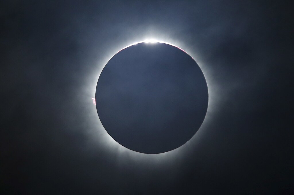 A solar eclipse is seen from the beach of Ternate island, Indonesia, March 9, 2016. REUTERS/Beawiharta