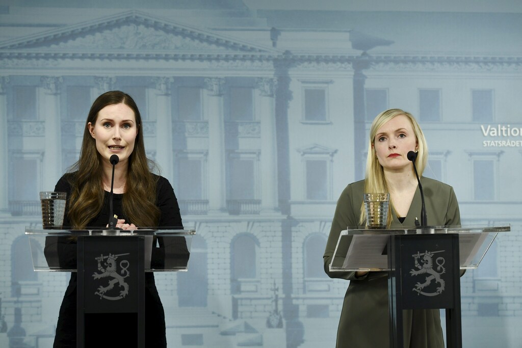 Finland's Prime Minister Sanna Marin and Minister of Interior Maria Ohisalo attend a news conference of the Finnish Government, regarding the coronavirus disease (COVID-19) spread, in Helsinki, Finland, May 4, 2020. Lehtikuva /Emmi Korhonen via REUTERS ATTENTION EDITORS - THIS IMAGE WAS PROVIDED BY A THIRD PARTY. NO THIRD PARTY SALES. NOT FOR USE BY REUTERS THIRD PARTY DISTRIBUTORS. FINLAND OUT. NO COMMERCIAL OR EDITORIAL SALES IN FINLAND. - RC2THG9Y54FF