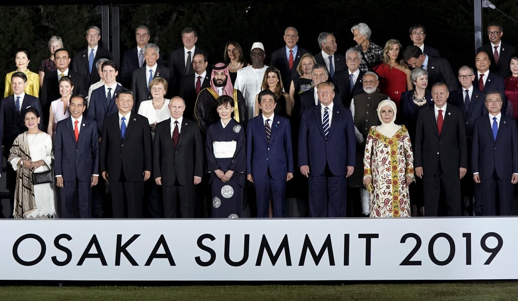 Leaders and delegates attend a family photo session at Osaka Geihinkan during the G20 leaders summit in Osaka, Japan, June 28, 2019. REUTERS/Kevin Lamarque - RC1B8EAD4E50