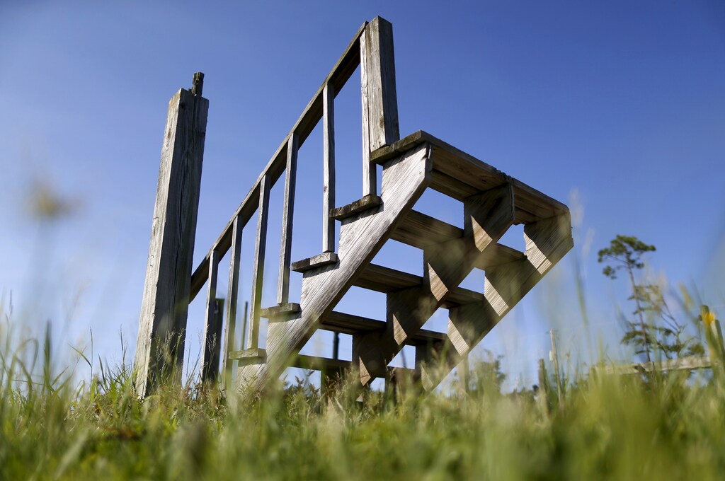 Stairs, which are all that remain where a house once stood, are pictured in Waveland, Mississippi, August 26, 2015. FEMA described Waveland as "ground zero" for Hurricane Katrina. Next to a newly built city hall and a business center, dozens of housing lots remain empty. Grass and brush have grown around old "for sale" signs, some of them offering reduced prices. The whole region is littered with memories of what happened 10 years ago, and the possessions and the people that were lost. Picture taken August 26, 2015. REUTERS/Jonathan Bachman TPX IMAGES OF THE DAY - RTX1Q1MB