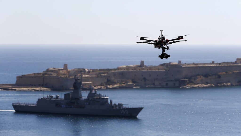 A drone is used for filming as the Australian frigate HMAS Anzac arrives in Valletta's Grand Harbour, Malta, May 11, 2015.
