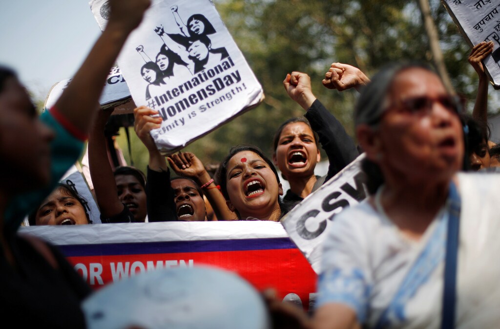 Girls shout slogans during a protest demanding equal rights for women on the occasion of International Women’s Day in New Delhi, India, March 8, 2018. Caption: Tackling gender-based violence is a key objective of Sustainable Development Goal 5.
