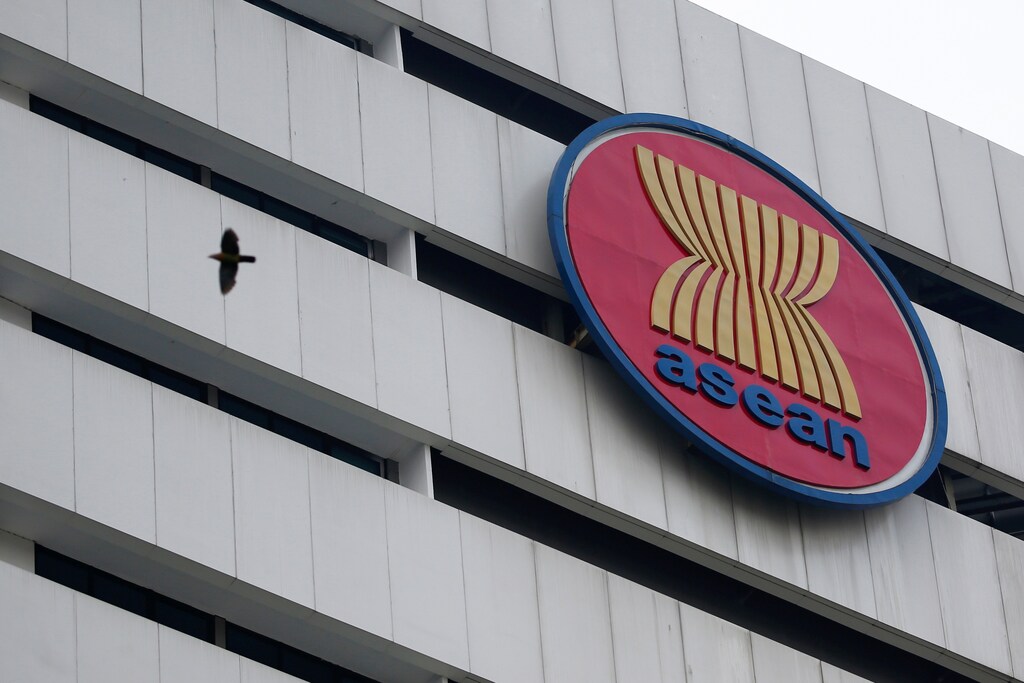 A bird flies near the Association of Southeast Asian Nations (ASEAN) secretariat building, ahead of the ASEAN leaders' meeting in Jakarta, Indonesia, April 23, 2021. REUTERS/Willy Kurniawan - RC2K1N9C16DM