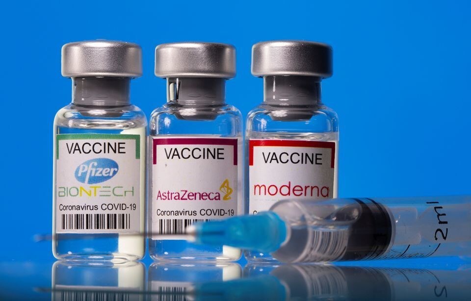 Vials with Pfizer-BioNTech, AstraZeneca, and Moderna coronavirus disease (COVID-19) vaccine labels are seen in this illustration picture taken March 19, 2021.