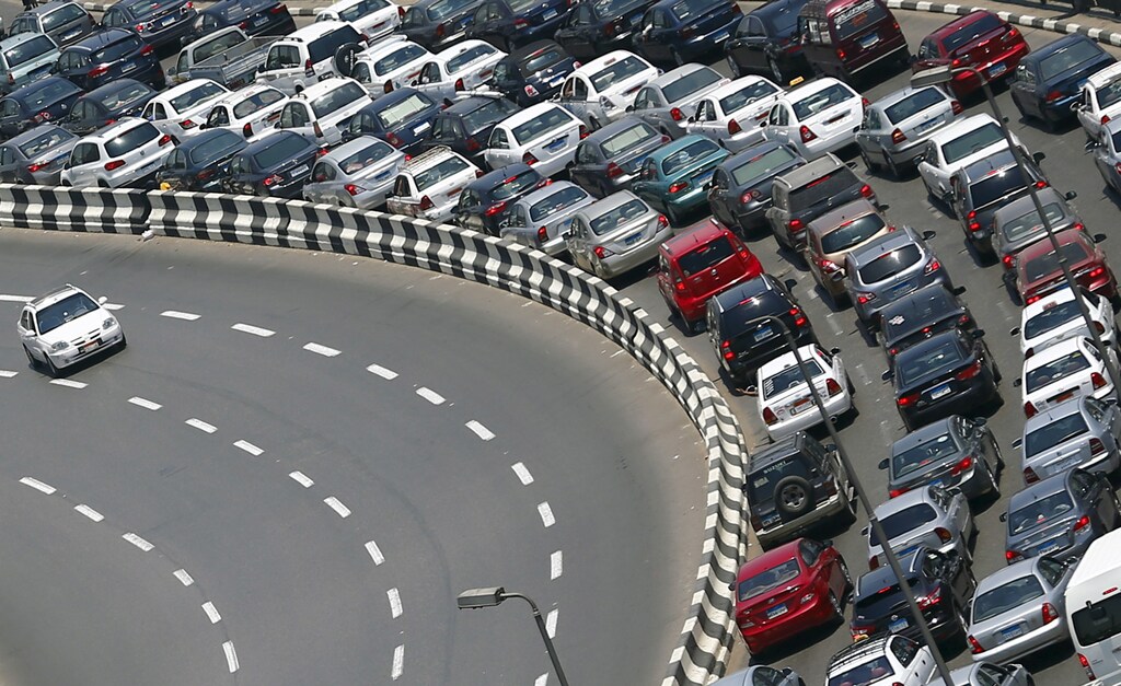 A taxi drives near a traffic jam at the 6th October bridge in downtown Cairo, Egypt June 3, 2015