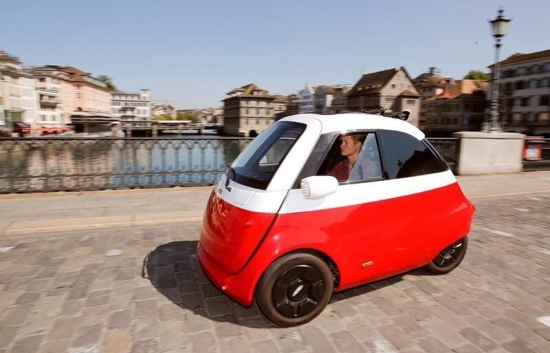 Chief Marketing Officer Merlin Ouboter of Swiss Microlino AG drives an electric-powered Microlino car in Zurich, Switzerland August 16, 2018.