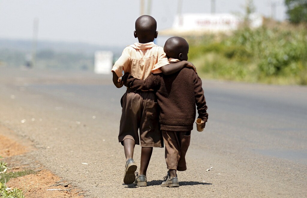 image of children walking home from school in the village of Kogelo, west of Kenya's capital Nairobi