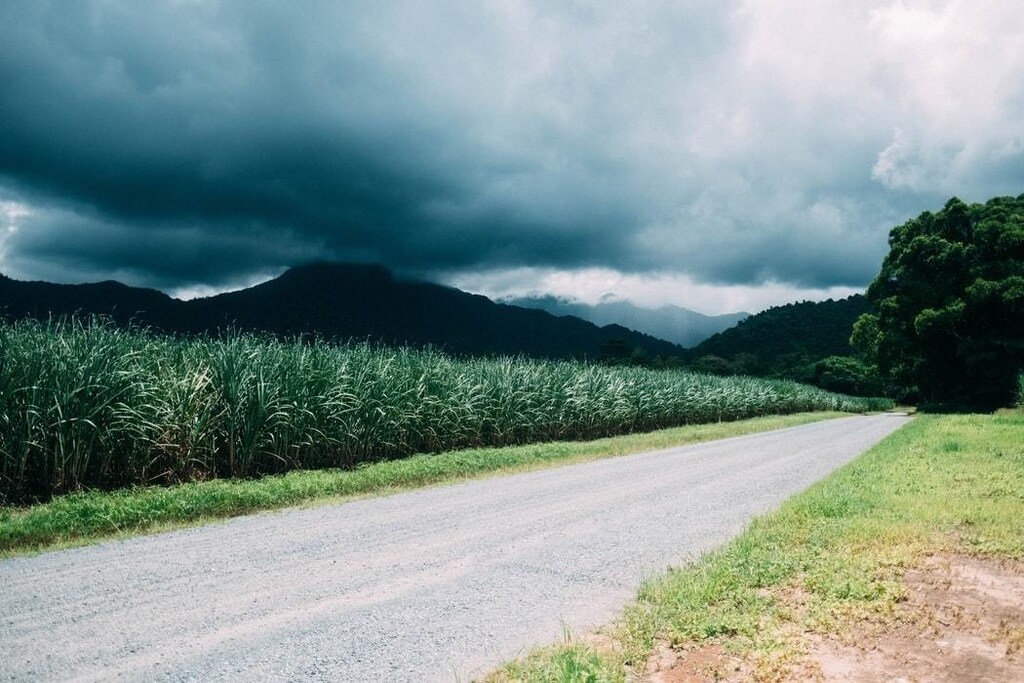 A tropical storm seen over a farm.