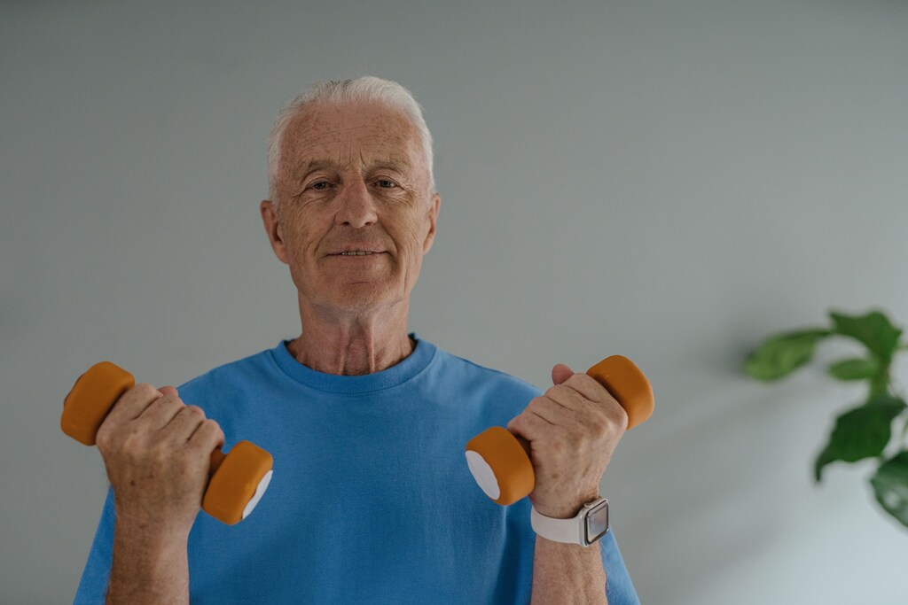The Stay Strong, Stay Healthy program includes instructor-led strength training exercises like bicep curls.