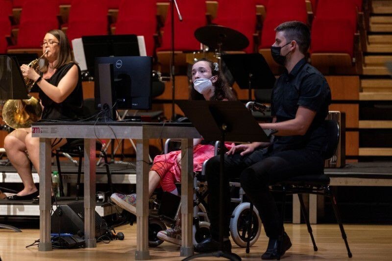 Alexandra Kerlidou, who has cerebral palsy, plays the "Eyeharp", a gaze-controlled digital software that allows people with disabilities to play music