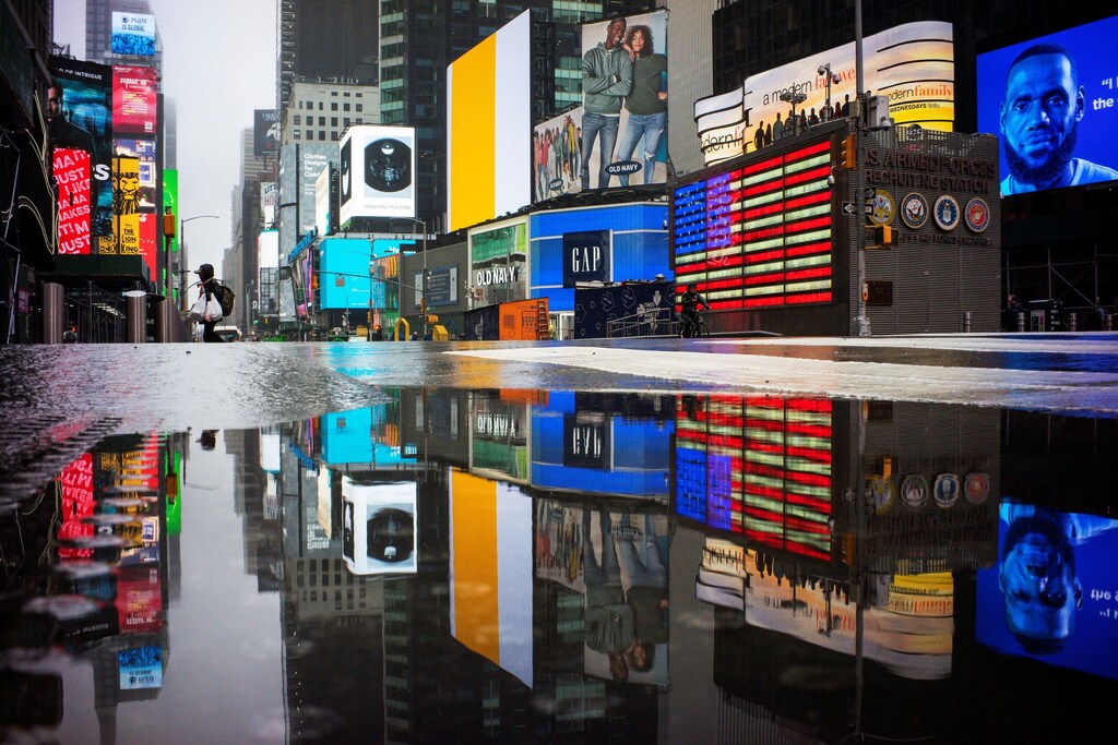 A man crosses 7av in an empty Times Square as the coronavirus disease (COVID-19) outbreak continues in New York City, U.S., March 29, 2020. REUTERS/Eduardo Munoz - Coronavirus china virus health healthcare who world health organization disease deaths pandemic epidemic worries concerns Health virus contagious contagion viruses diseases disease lab laboratory doctor health dr nurse medical medicine drugs vaccines vaccinations inoculations technology testing test medicinal biotechnology biotech biology chemistry physics microscope research influenza flu cold common cold bug risk symptomes respiratory china iran italy europe asia america south america north washing hands wash hands coughs sneezes spread spreading precaution precautions health warning covid 19 cov SARS 2019ncov wuhan sarscow wuhanpneumonia pneumonia outbreak patients unhealthy fatality mortality elderly old elder age serious death deathly deadly