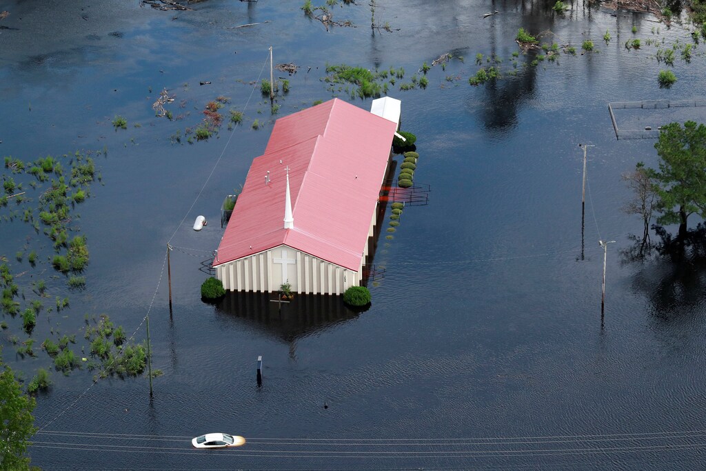 The Rock Hill Missionary Baptist Church is seen in floodwater caused by Hurricane Florence, in this aerial picture, in Lumberton, North Carolina, U.S. September 17, 2018. REUTERS/Jason Miczek TPX IMAGES OF THE DAY - RC1F50809A30