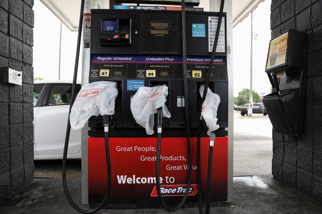 Gas pumps are covered with plastic bags at the Race Trac gas station, after a cyberattack crippled the biggest fuel pipeline in the country, run by Colonial Pipeline, in St. Petersburg, Florida, U.S., May 12, 2021. REUTERS/Octavio Jones - RC2HEN93DUS8