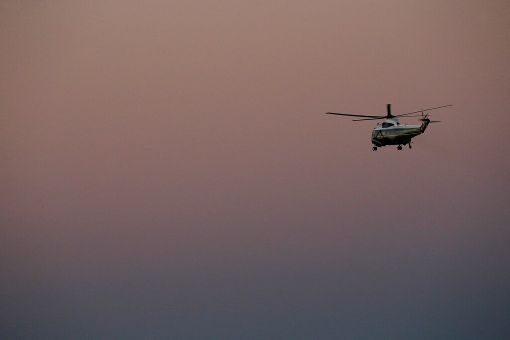 U.S. President Barack Obama travels aboard the Marine One helicopter to the White House from Joint Base Andrews, Maryland, U.S. October 9, 2016. REUTERS/Jonathan Ernst - RTSRIA7