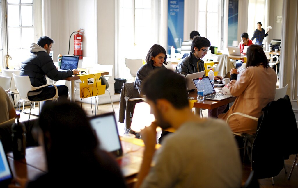 Participants of the "Start Up Chile" program work at their headquarters in Santiago, August 10, 2015. Drawn in by equity-free financing and promises of hands-on mentorship, dozens of female entrepreneurs will head to Chile in the coming weeks to participate in what the government says is the world's first state-run start-up program aimed exclusively at women. It's not the first attempt by Chile to catalyze its start-up scene. Since 2010, the government has awarded over $40 million in seed capital to thousands of up-and-coming innovators, according to its own statistics. Picture taken August 10, 2015. REUTERS/Ivan Alvarado - RTX1OJWO