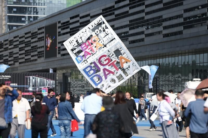 Visitors are seen outside the venue of China International Big Data Industry Expo in Guiyang, Guizhou province May 27, 2017.